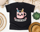 Teach Love Inspire Mug graphic tee in Black