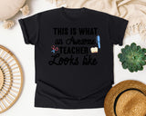 This Is What An Awesome Teacher Looks Like graphic tee in Black