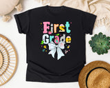 First Grade Paper Bow graphic tee in Black