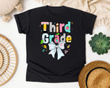 Third Grade Paper Bow graphic tee in Black