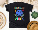 First Grade Vibes Checkered Smiley graphic tee in Black