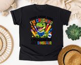 Crushing Kindergarten Like A Dinosaur Graphic Tee graphic tee in Black