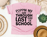 Poppin My Way Through Last Day Of School White graphic tee in Blossom