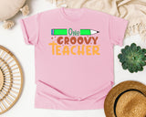 One Groovy Teacher graphic tee in Blossom