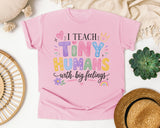 I Teach Tiny Humans With Big Feelings graphic tee in Blossom
