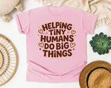 Helping Tiny Humans Do Big Things Retro graphic tee in Blossom