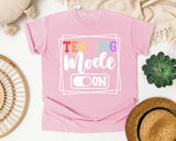 Testing Mode On graphic tee in Blossom