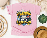 Learning Is My Superpower graphic tee in Blossom