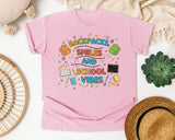 Backpacks Smiles And School Vibes Doodle graphic tee in Blossom