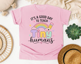 Its A Good Day To Teach Tiny Humans Pastel graphic tee in Blossom