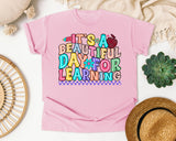 Its A Beautiful Day For Learning graphic tee in Blossom