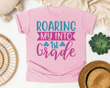 Roaring My Into 1st Grade graphic tee in Blossom