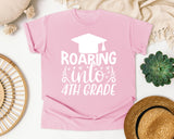 Roaring Into 4th Grade White 2 graphic tee in Blossom