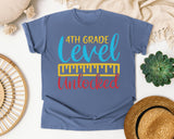 4th Grade Level Unlocked Teal graphic tee in Blue Jean