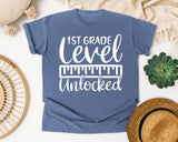 1st Grade Level Unlocked White graphic tee in Blue Jean