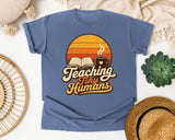 Teaching Tiny Humans Retro Sunset graphic tee in Blue Jean