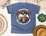 Surviving Fatherhood One Beer At A Time Brown graphic tee in Blue Jean