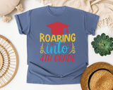 Roaring Into 4th Grade White 2 3 graphic tee in Blue Jean