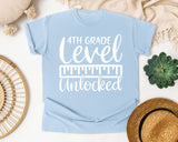 4th Grade Level Unlocked White graphic tee in Chambray