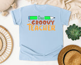 One Groovy Teacher graphic tee in Chambray
