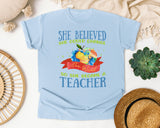 She Believed She Could Change The World So She Became A Teacher graphic tee in Chambray