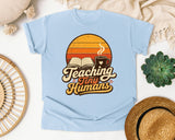 Teaching Tiny Humans Retro Sunset graphic tee in Chambray