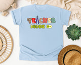 Teacher Mode On graphic tee in Chambray