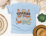 Teaching Tiny Humans Making Big Impact graphic tee in Chambray