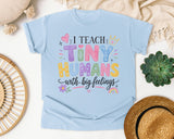 I Teach Tiny Humans With Big Feelings graphic tee in Chambray