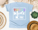 Testing Mode On graphic tee in Chambray