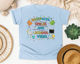 Backpacks Smiles And School Vibes Doodle graphic tee in Chambray