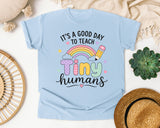 Its A Good Day To Teach Tiny Humans Pastel graphic tee in Chambray