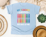 My Teacher Survived 100 Days Of Me Crayons graphic tee in Chambray