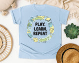 Play Learn Repeat graphic tee in Chambray