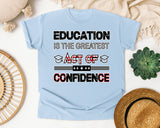 Education Is The Greatest Act Of Confidence Bold Graphic Tee graphic tee in Chambray