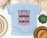 Surviving Fatherhood One Beer At A Time Grey 3 graphic tee in Chambray