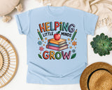 Helping Little Minds Grow Books graphic tee in Chambray