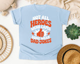Not All Heroes Wear Capes Some Wear Dad Jokes Orange 2 graphic tee in Chambray