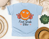 First Grade Vibes Smiley graphic tee in Chambray