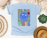 First Grade Vibes Checkered Smiley graphic tee in Chambray