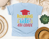 Roaring Into 4th Grade White 2 3 graphic tee in Chambray