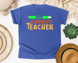 One Groovy Teacher graphic tee in Flo Blue