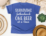 Surviving Fatherhood One Beer At A Time Classic graphic tee in Flo Blue