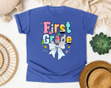 First Grade Paper Bow graphic tee in Flo Blue