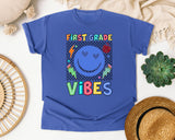 First Grade Vibes Checkered Smiley graphic tee in Flo Blue