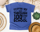 Poppin My Way Through 100 Days Of School White graphic tee in Flo Blue