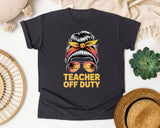 Teacher Off Duty Messy Bun Sunset graphic tee in Graphite