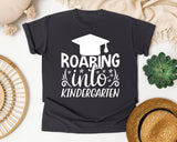 Roaring Into Kindergarten White 2 graphic tee in Graphite