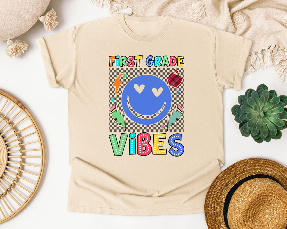 First Grade Vibes Checkered Smiley graphic tee in Ivory