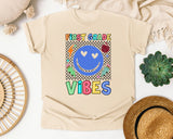 First Grade Vibes Checkered Smiley graphic tee in Ivory